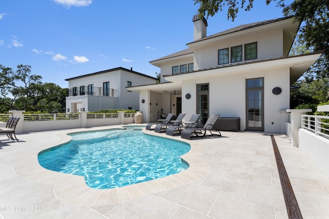 view of pool with a patio