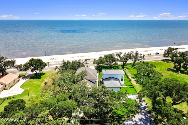 aerial view with a water view and a view of the beach