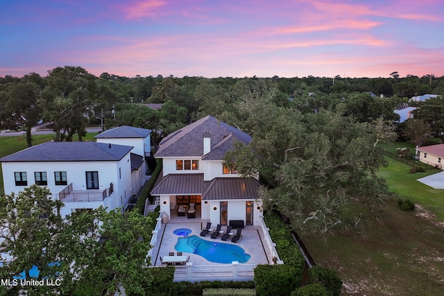 view of aerial view at dusk