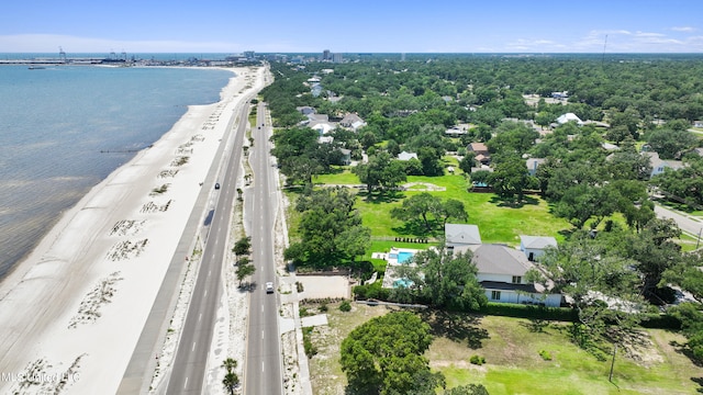 bird's eye view featuring a water view and a view of the beach