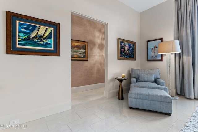 living area with light tile patterned floors