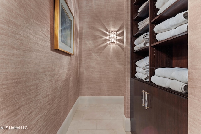 wine cellar with light tile patterned floors