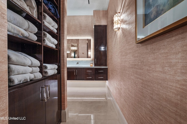 bathroom featuring vanity and tile patterned flooring