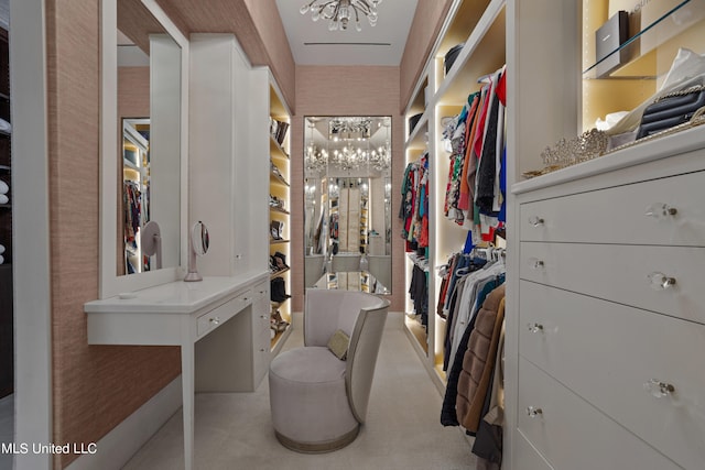 spacious closet with light colored carpet