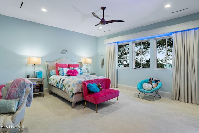 bedroom with light colored carpet and ceiling fan