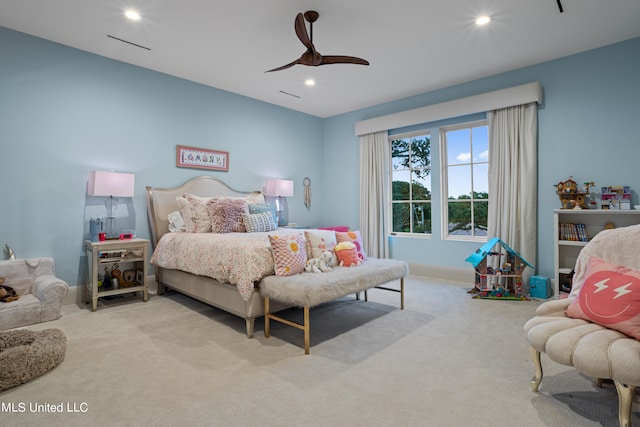 bedroom with light carpet and ceiling fan