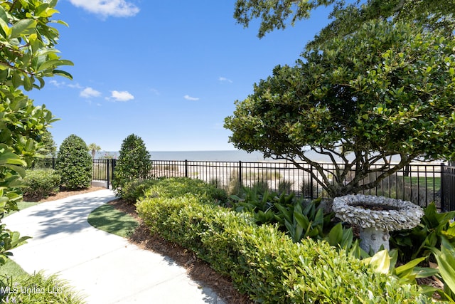 view of patio with a water view