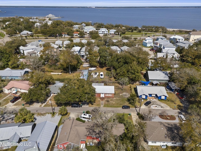 bird's eye view with a residential view and a water view