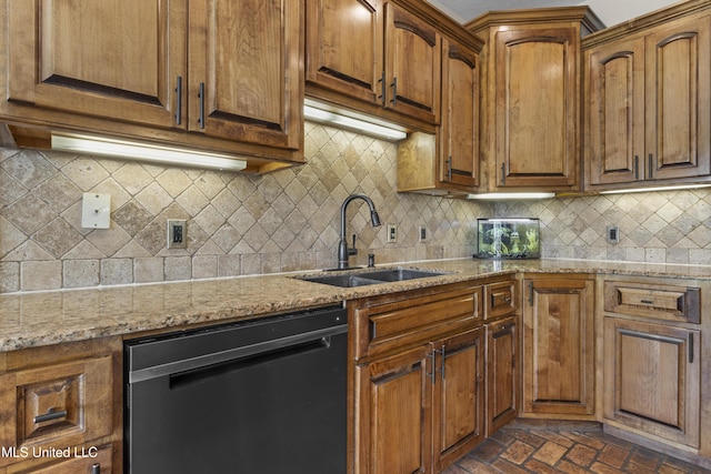 12219 County Farm Rd, Gulfport, MS 39503 - kitchen with dishwashing machine, brick flooring, light stone counters, and brown cabinetry