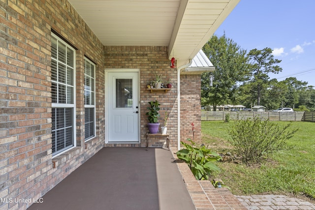 12219 County Farm Rd, Gulfport, MS 39503 - view of exterior entry featuring brick siding