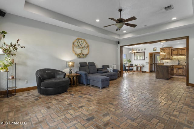 12219 County Farm Rd, Gulfport, MS 39503 - living area featuring a ceiling fan, recessed lighting, a chandelier, and brick flooring
