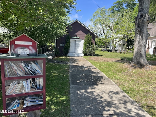 exterior space with a front yard