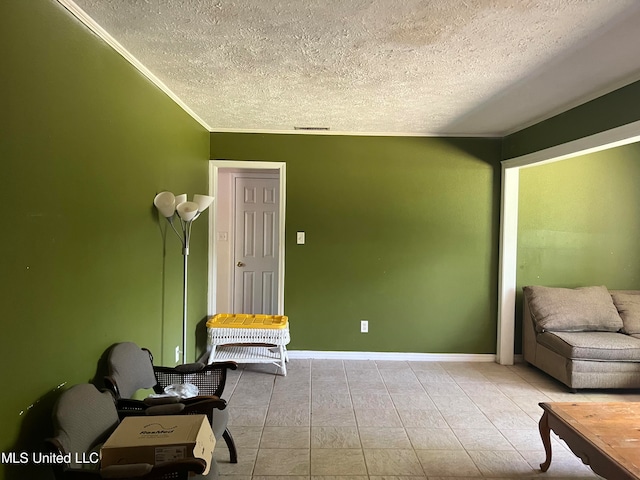 living area with a textured ceiling