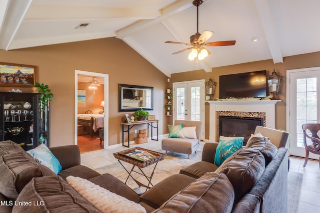 109 Palm Ave, Pass Christian, MS 39571 - living area with a ceiling fan, light tile patterned floors, and a tiled fireplace