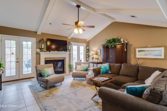109 Palm Ave, Pass Christian, MS 39571 - living area with french doors, light tile patterned floors, a fireplace, and ceiling fan