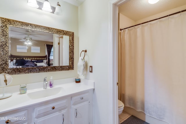 109 Palm Ave, Pass Christian, MS 39571 - full bath featuring vanity, toilet, tile patterned floors, and a shower with shower curtain