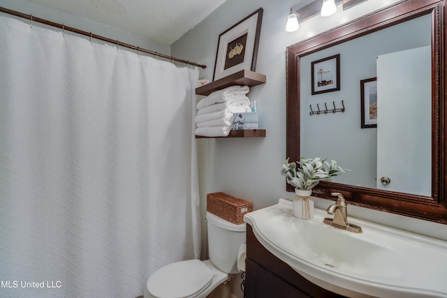 109 Palm Ave, Pass Christian, MS 39571 - full bathroom with vanity, toilet, and a shower with curtain