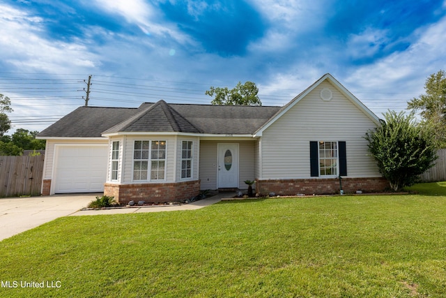 11318 Fairfield Ln, Gulfport, MS 39503 - single story home with a garage, fence, a front lawn, brick siding, and driveway