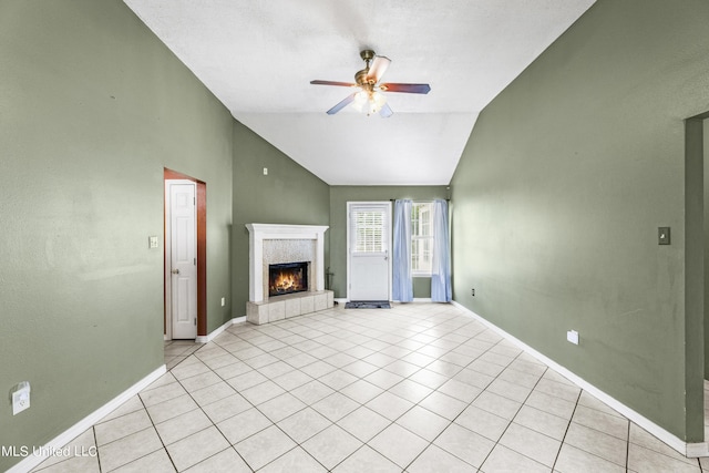 11318 Fairfield Ln, Gulfport, MS 39503 - unfurnished living room with vaulted ceiling, a fireplace, baseboards, and a ceiling fan