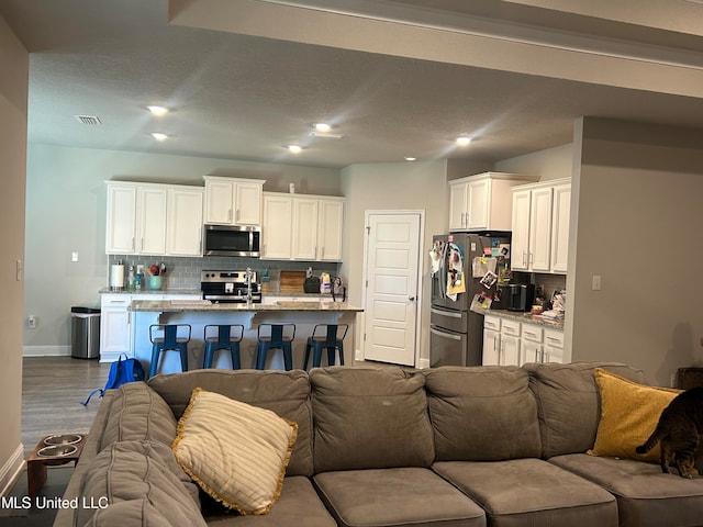 living room with hardwood / wood-style flooring