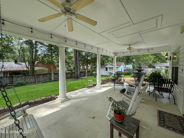 view of patio featuring ceiling fan