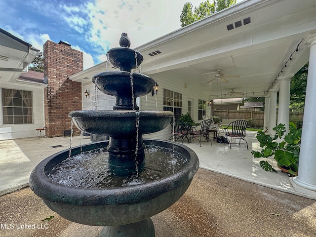 view of patio featuring ceiling fan