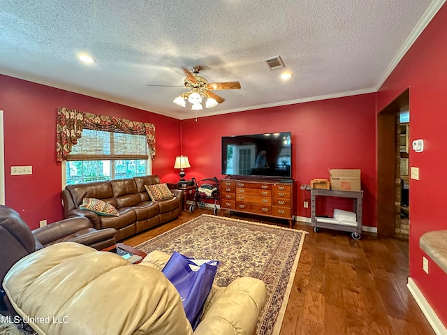 living room featuring crown molding, a textured ceiling, ceiling fan, and dark hardwood / wood-style flooring