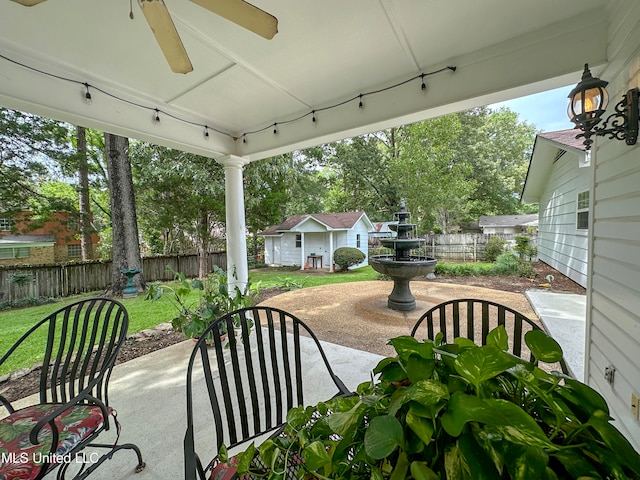 view of patio / terrace featuring ceiling fan