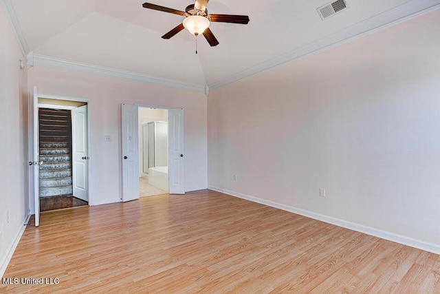 unfurnished bedroom featuring ceiling fan, lofted ceiling, ensuite bath, light hardwood / wood-style flooring, and ornamental molding