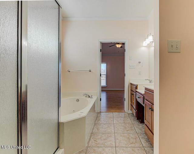 bathroom featuring ceiling fan, plus walk in shower, tile patterned floors, ornamental molding, and vanity