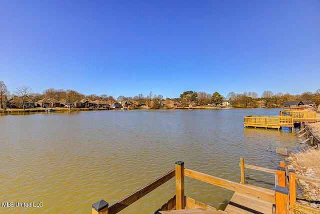 view of dock with a water view