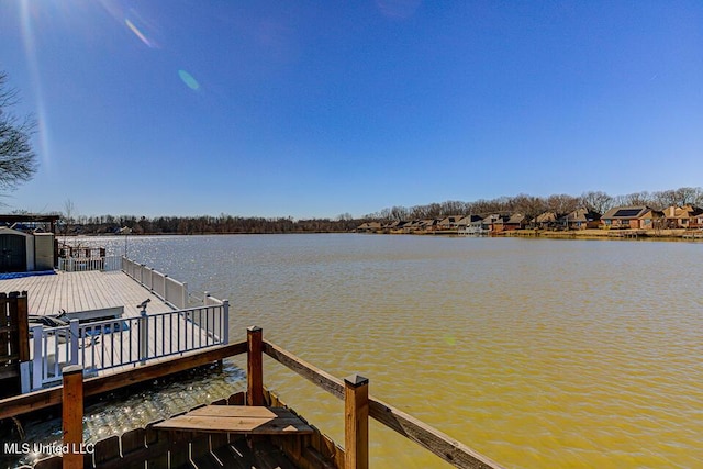 view of dock with a water view