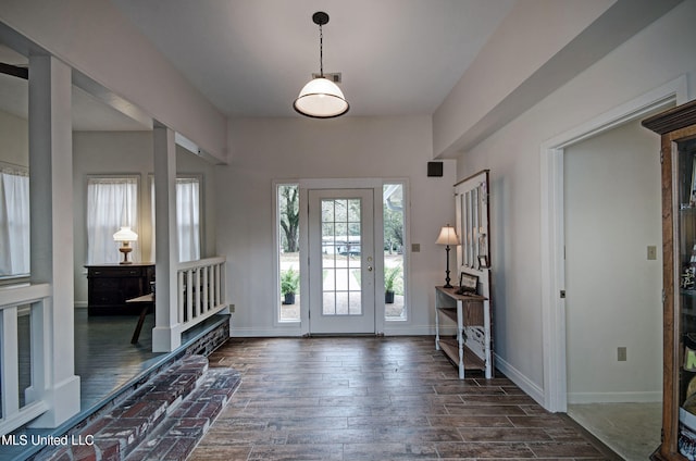 foyer with dark wood-type flooring