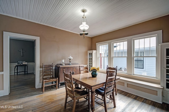 dining room with hardwood / wood-style flooring