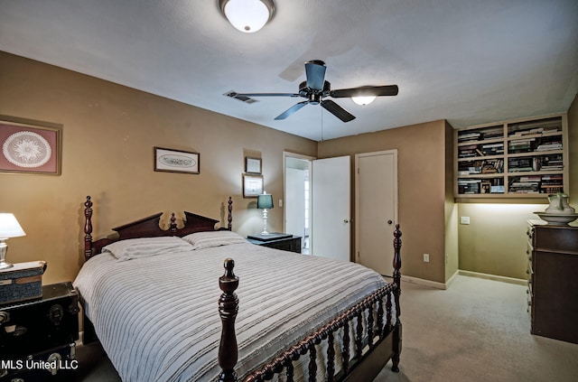 carpeted bedroom featuring ceiling fan