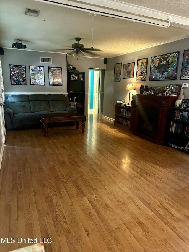 8215 Whitehead Dr, Southaven, MS 38671 - living area with a ceiling fan and wood finished floors