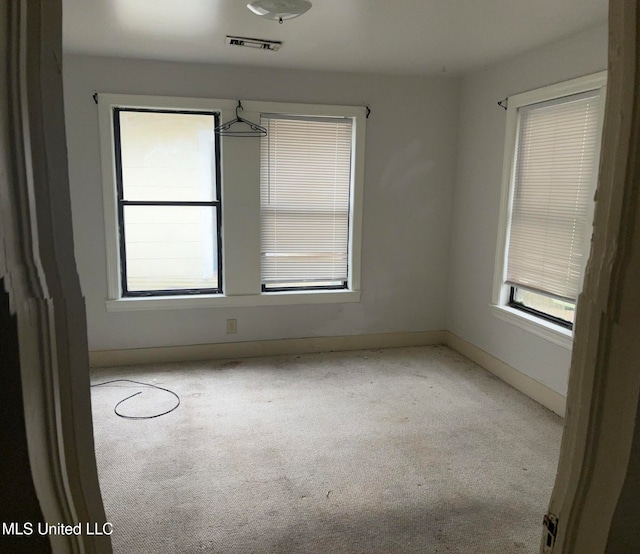 view of carpeted spare room