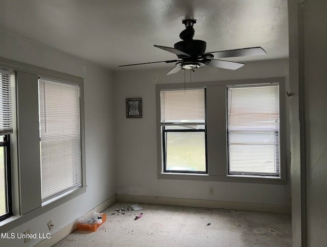 empty room featuring ceiling fan