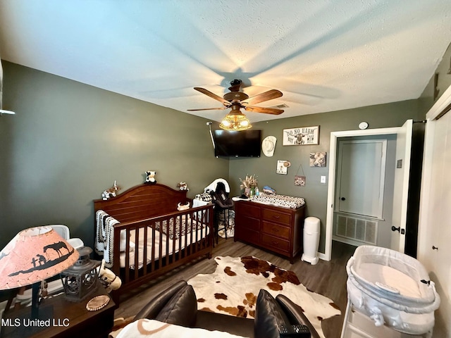 412 Monica Ln, Pearl, MS 39208 - bedroom with wood finished floors and ceiling fan