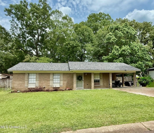 412 Monica Ln, Pearl, MS 39208 - single story home featuring driveway, an attached carport, brick siding, and a shingled roof