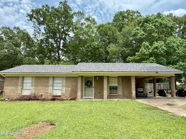 412 Monica Ln, Pearl, MS 39208 - ranch-style house with concrete driveway, a carport, brick siding, and a shingled roof