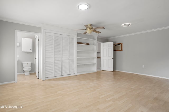 unfurnished bedroom with ceiling fan, ensuite bath, ornamental molding, and light hardwood / wood-style flooring