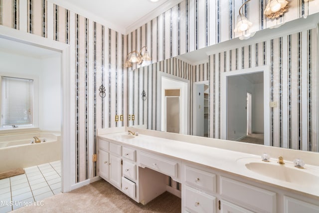 bathroom featuring tile patterned flooring, a washtub, vanity, and ornamental molding