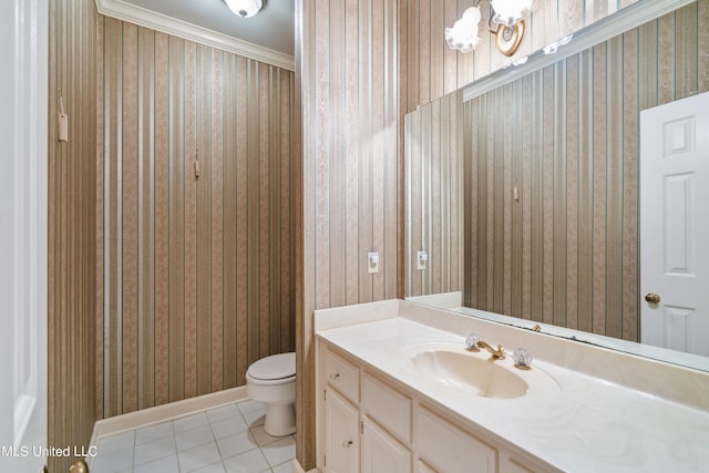 bathroom featuring crown molding, tile patterned flooring, vanity, and toilet