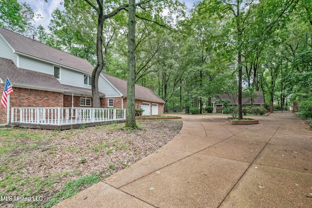 view of yard with a garage