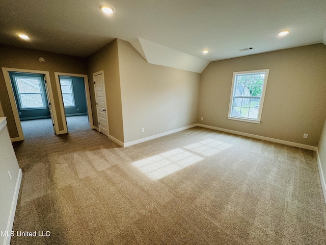 3919 Mcelroy Farms Dr, Olive Branch, MS 38654 - empty room with carpet flooring, lofted ceiling, and recessed lighting