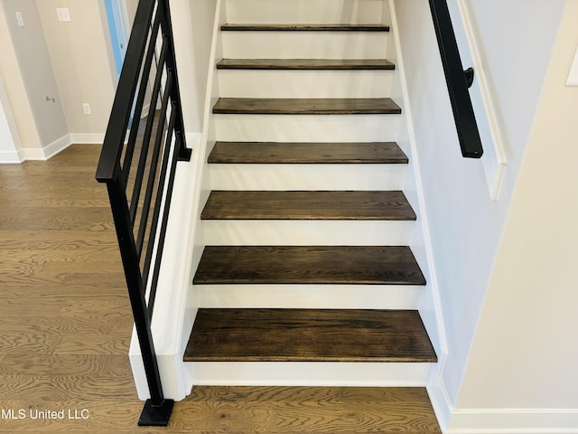 3919 Mcelroy Farms Dr, Olive Branch, MS 38654 - stairway with wood finished floors and baseboards