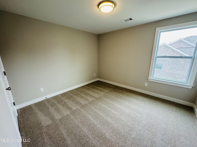 3919 Mcelroy Farms Dr, Olive Branch, MS 38654 - carpeted empty room featuring baseboards