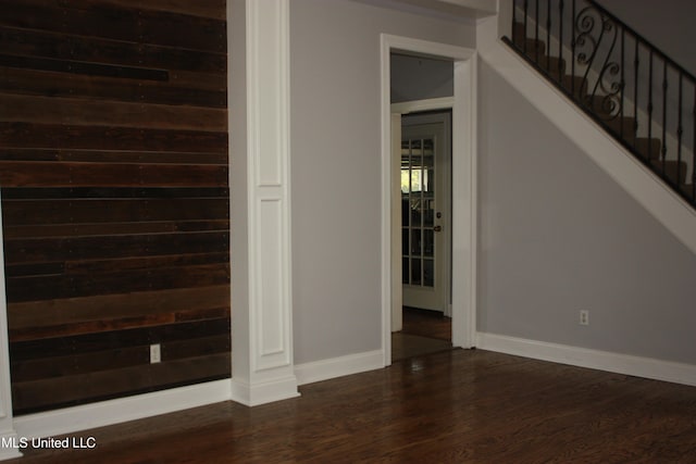 stairs with hardwood / wood-style floors