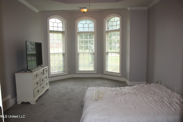 unfurnished bedroom with light colored carpet and crown molding